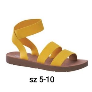 Yellow slip on sandals